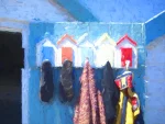 This beautifully painted scene of a beach hut, considered by many as a Home from Home> A digital painting by Charles David