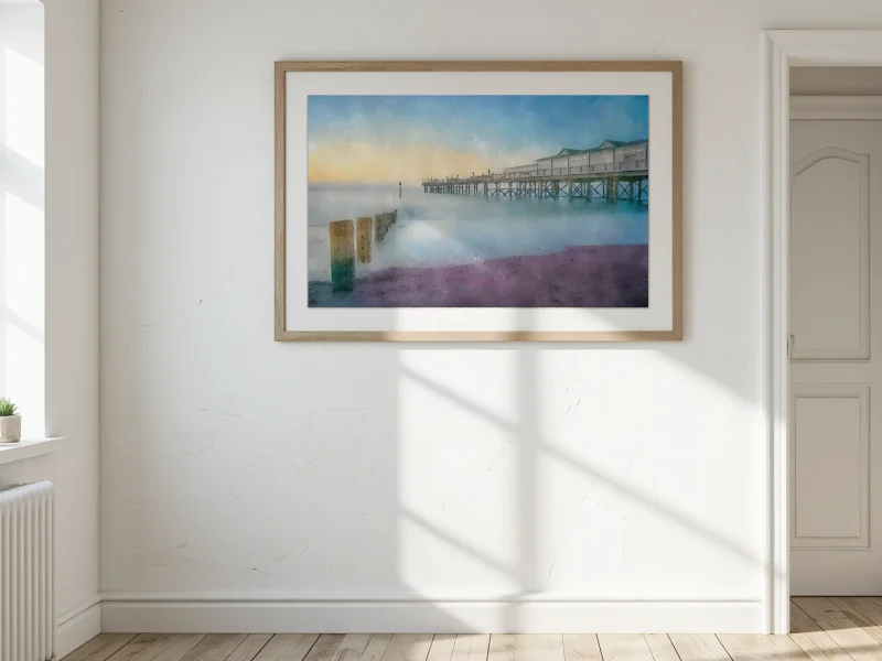 A serene Teignmouth Pier at Dawn belies the history of this impressive monument.. Digitally painted by Alex Hamer