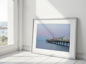 Paignton Pier Blue Hour is an enigmatic view of this iconic structure taken by Alex Hamer
