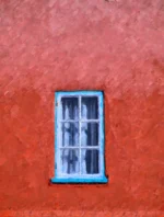 Blue Window in a Red Wall is a fine art print of Portmeirion South Wales by Charles David | The Creative Camera